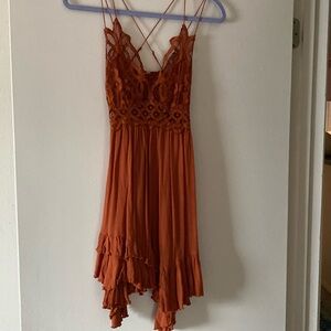 Gorgeous Free People mini dress with lace bodice.
